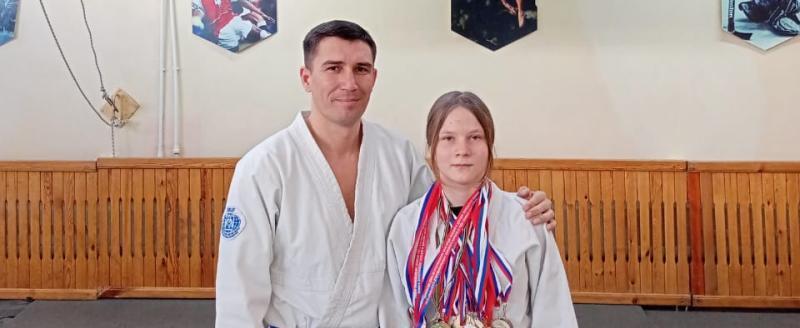 Валерия с тренером Сергеем Худайбергановым 